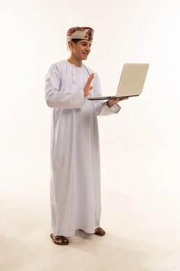 Omani Man Using Laptop on White Background