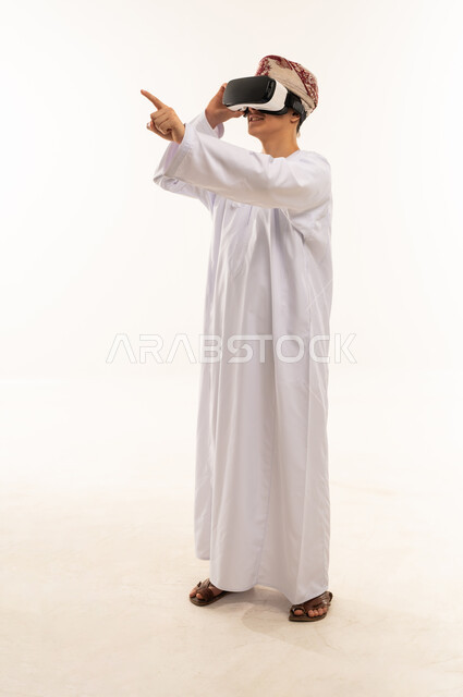 Omani Man Wearing VR Headset on White Background