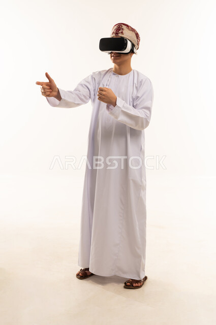 Omani Man Using Virtual Reality Headset in Studio