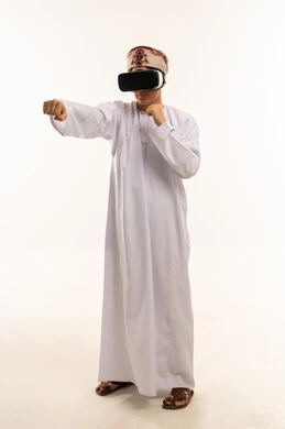 Omani Man in VR Headset Boxing in Studio