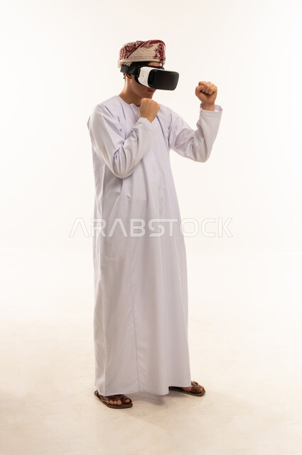 Omani Man Wearing VR Headset in Boxing Stance