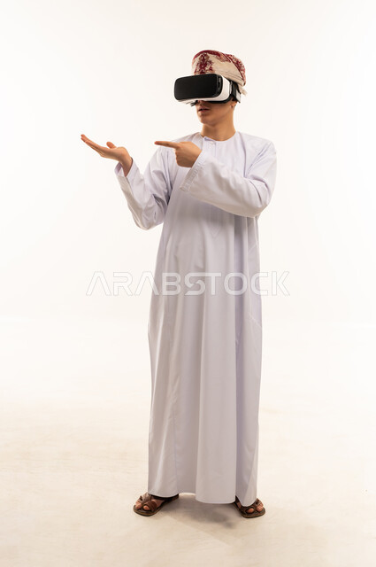 Omani Man in Traditional Dress Using VR Headset