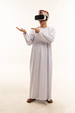 Omani Man in Traditional Dress Using VR Headset