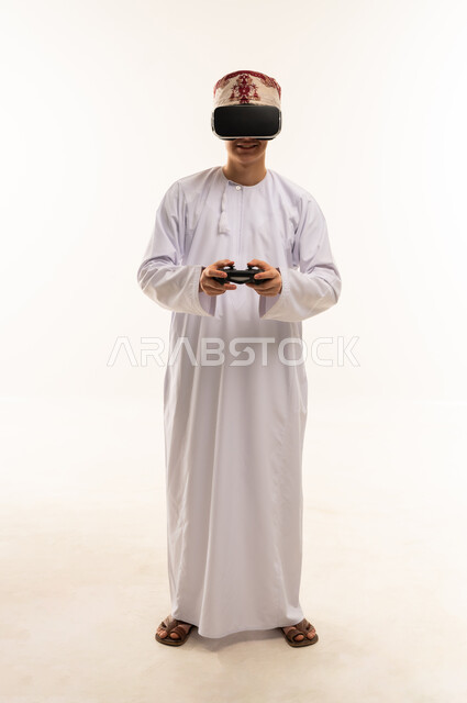 Omani Man Wearing VR Headset with Gaming Controller
