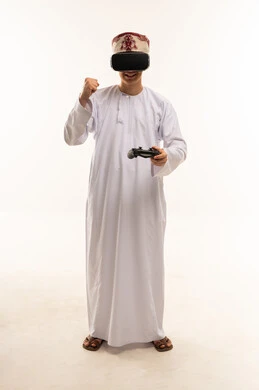 Omani Man Playing VR Games with Controller