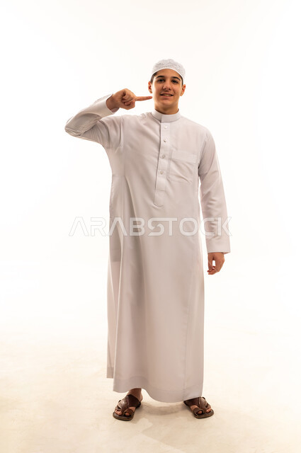Saudi Man in White Thobe Pointing on White Background