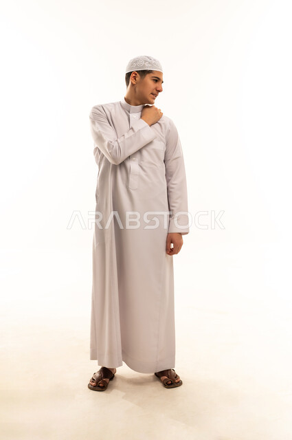 Young Saudi Man in Traditional White Thobe Studio Shot