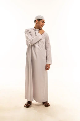 Young Saudi Man in Traditional White Thobe Studio Shot