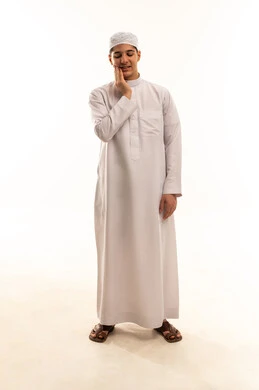 Saudi Boy in White Thobe with Toothache Pain