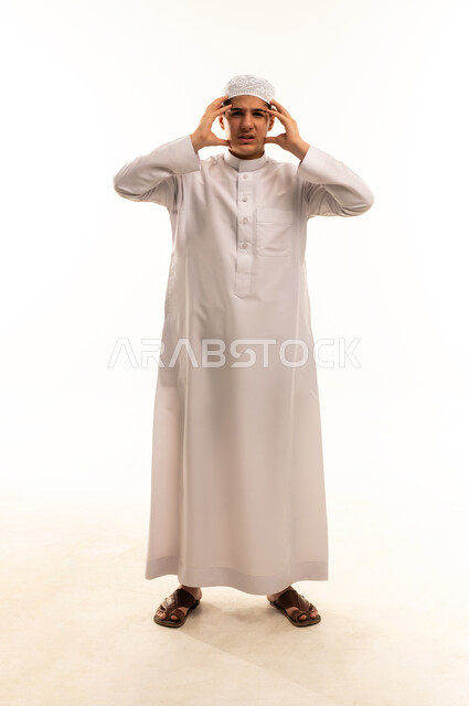 Saudi Man in White Thobe Expressing Frustration