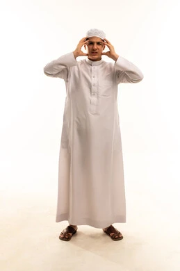 Saudi Man in White Thobe Expressing Frustration