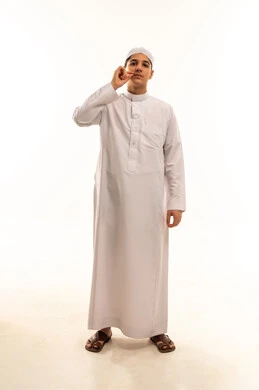 Arab Man in White Thobe Making Silence Gesture
