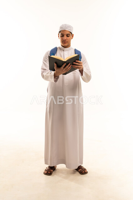 Arab Student Reading Book with Backpack on White Background
