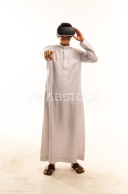 Saudi Man Using VR Headset on White Background