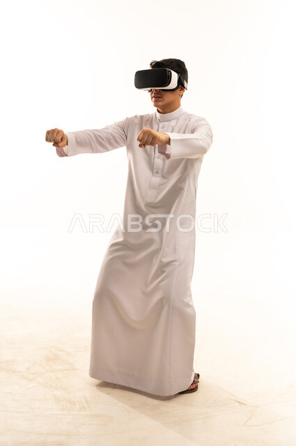 Saudi Man Wearing VR Headset Studio White Background