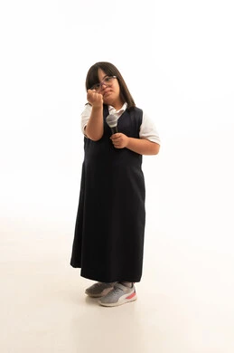 Saudi Girl with Down Syndrome Holding Microphone