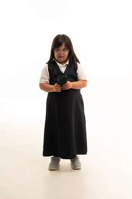 Saudi Girl with Down Syndrome in School Uniform