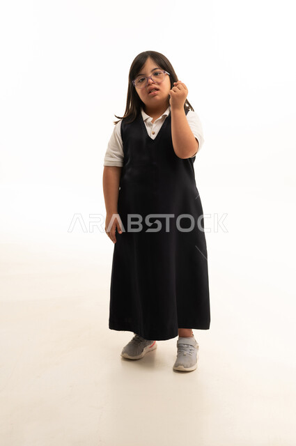 Saudi Girl with Down Syndrome in School Uniform