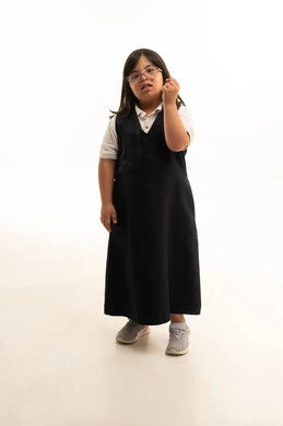 Saudi Girl with Down Syndrome in School Uniform