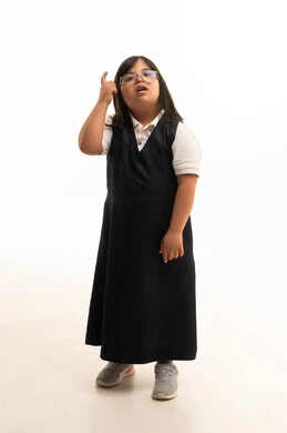 Saudi Girl with Down Syndrome in School Uniform