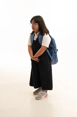 Saudi Girl with Down Syndrome in School Uniform