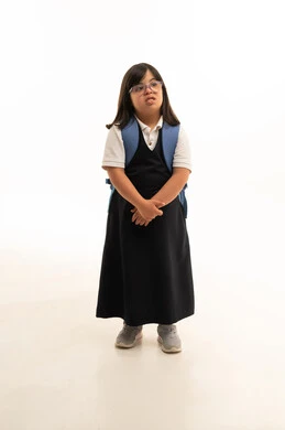 Saudi Girl with Down Syndrome in School Uniform