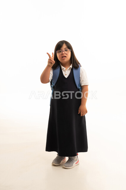 Saudi Schoolgirl with Down Syndrome Making Peace Sign