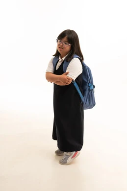 Saudi Girl with Down Syndrome in School Uniform