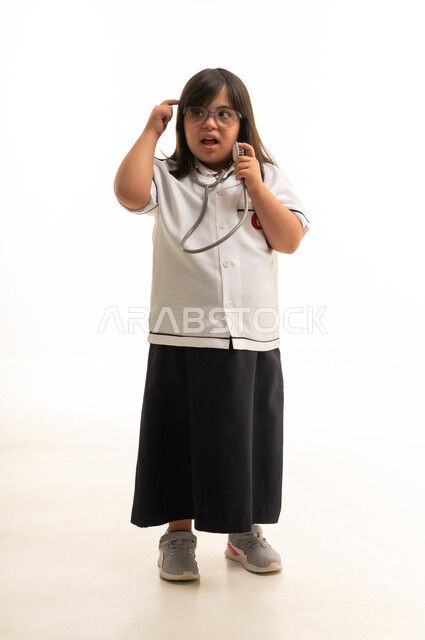 Saudi Girl with Down Syndrome in Doctor Uniform