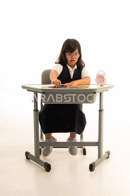 Saudi Girl with Down Syndrome at School Desk