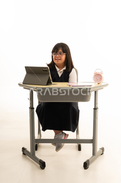 Saudi Girl with Down Syndrome at School Desk Studio
