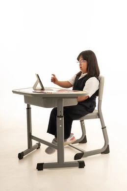 Arab Girl with Down Syndrome Learning on Tablet