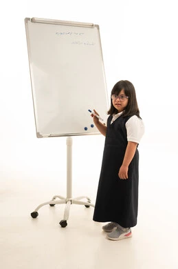 Saudi Student with Down Syndrome at Whiteboard