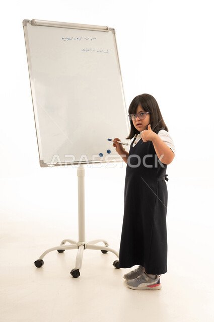Saudi Girl with Down Syndrome in School Uniform