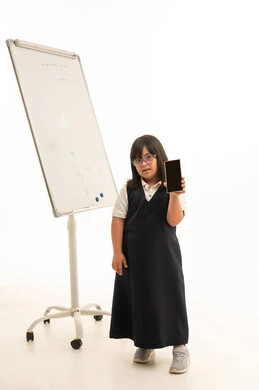 Saudi Girl with Down Syndrome Holding Smartphone