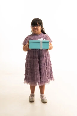 Saudi Girl with Down Syndrome Holding Gift Box