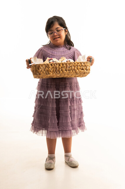 Saudi Girl with Down Syndrome Holding Wicker Basket