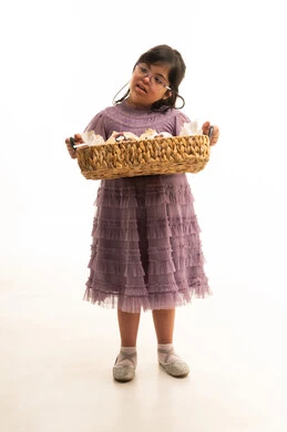 Saudi Girl with Down Syndrome Holding Gift Basket