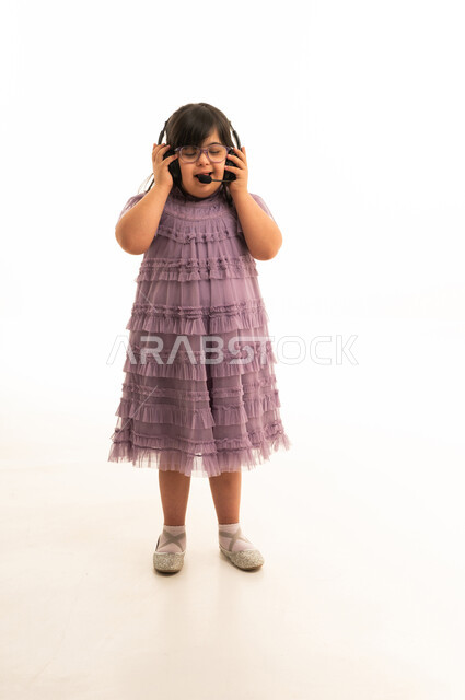 Saudi Girl with Down Syndrome Wearing Headset Studio