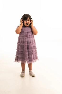 Saudi Girl with Down Syndrome Wearing Headset Studio