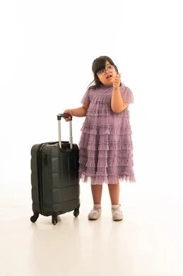 Arab Girl with Down Syndrome and Suitcase Travel Studio