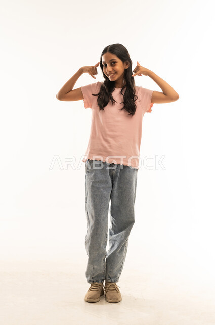 Saudi Girl Making Call Me Hand Gesture on White Background