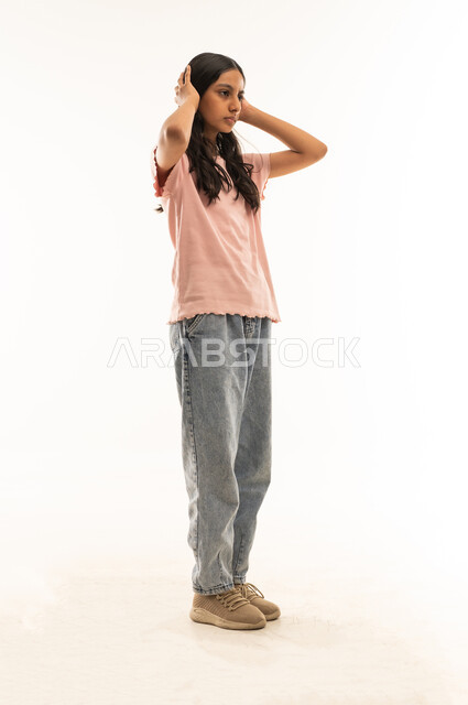 Arab Girl Covering Ears on White Background