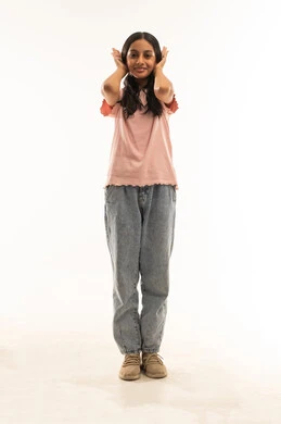 Saudi Girl Covering Ears in Studio Portrait on White Background Saudi Girl Covering Ears in Studio Portrait on White Background