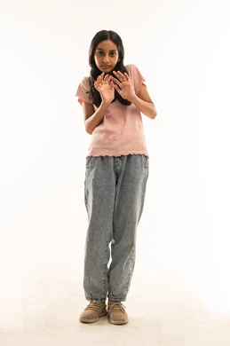 Omani Girl in Casual Wear Defensive Gesture