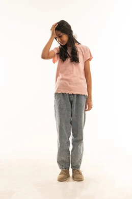 Tired Omani Girl in Studio Holding Head