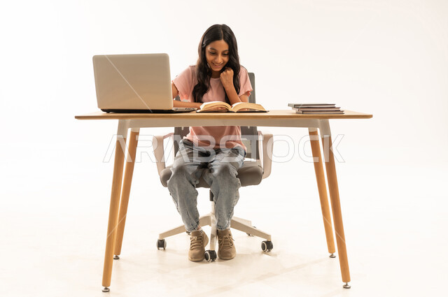 Saudi Girl Studying with Laptop on White Background