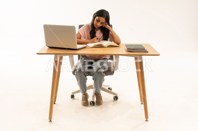 Saudi Girl Studying with Laptop on White Background