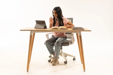 Arab Girl Waving During Online Video Call on Tablet