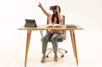 Saudi Girl Student Using VR Headset While Studying